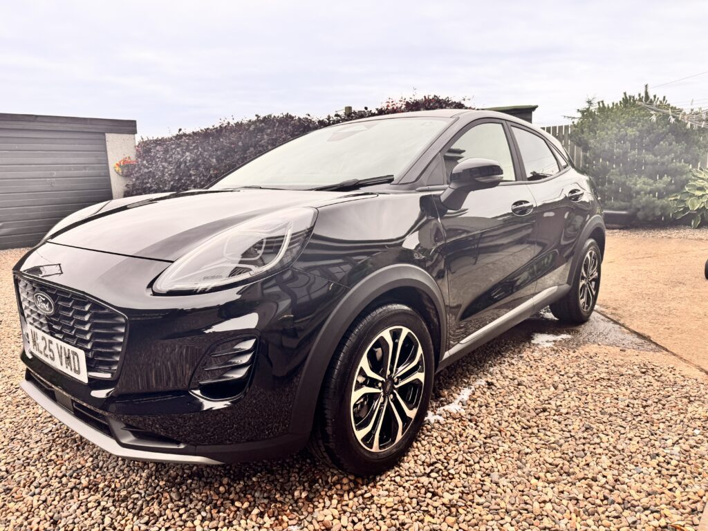 alt="Mobile car valeting Dundee – freshly cleaned black Ford Puma after valet service by Tidy Job Ltd"